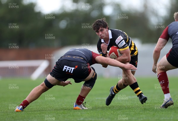 120926 - Newport RFC v Rygbi RGC - Super Rygbi Cymru - SRC - Brogan Leary of Newport is tackled by Harper Chamberlain of RGC 