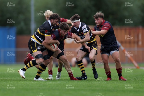 120926 - Newport RFC v Rygbi RGC - Super Rygbi Cymru - SRC - Will Kellett of RGC is tackled by Ben Roach of Newport 