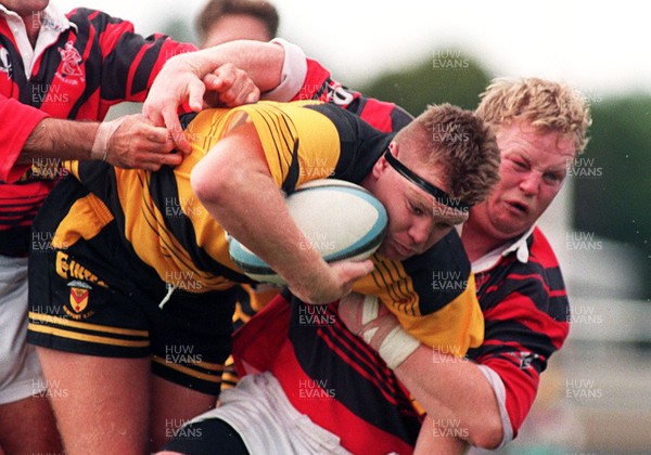 020995 - Newport v Aberavon - Mark Workman of Newport is tackled by Billy Shenton