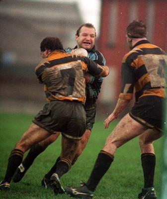 031294 - Newport v Cardiff - Colin Laity of Cardiff is tackled by Alun Carter of Newport