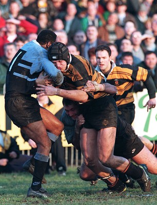 260197 - Newport v Cardiff - Jan Machacek drives into Nigel Walker as Emyr Lewis tackles