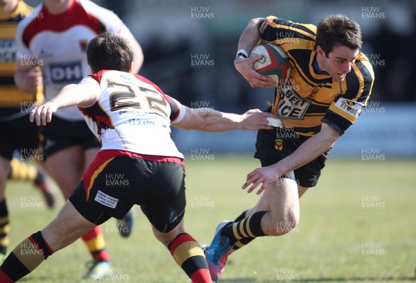 060413 - Newport RFC v Carmarthen Quins, Principality Premiership - Newport's Elliot Frewen takes on the Carmarthen Quins defence