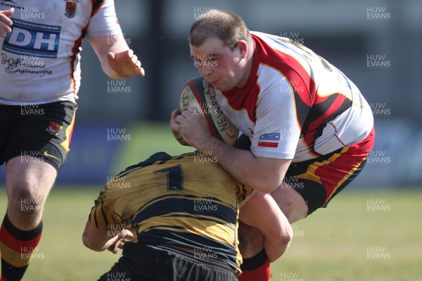 060413 - Newport RFC v Carmarthen Quins, Principality Premiership - Carmarthen Quins' Ian Jones is tackled