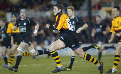 050203 - Newport v Neath - Welsh Premiership - Newport's Jon Pritchard takes on the Neath defence