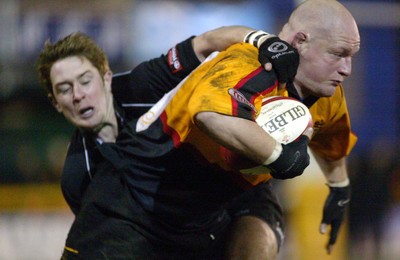 050203 - Newport v Neath - Welsh Premiership - Newport's Paul Young is caught by Shane Williams