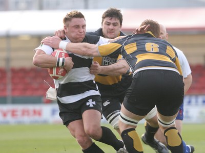 10.04.10 Newport v Neath... Neath's Gerwyn Price is tackled by Richard Dale. 