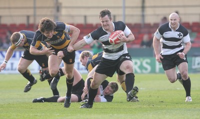 10.04.10 Newport v Neath... Neath's Gareth King hands off Alex Walker. 