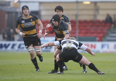 10.04.10 Newport v Neath... Newport's Dai Pattison is tackled by Ashley James. 