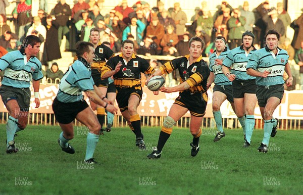 091295 - Newport v Newbridge - Adam Palfrey of Newport gets the ball away