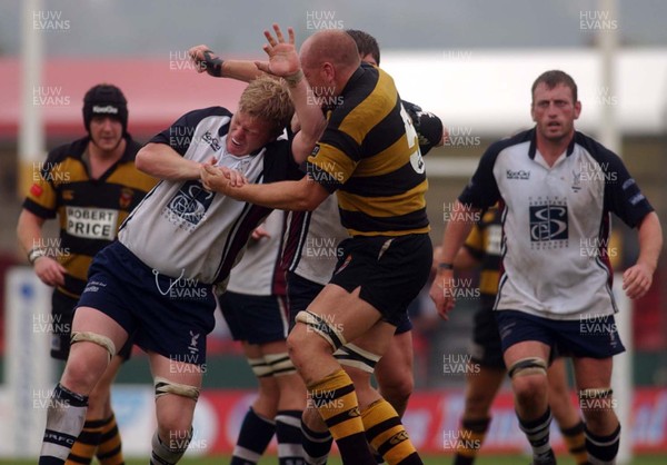 100905 - Newport RFC v Swansea RFC - Newport's Matthew Veater and Swansea's Noel Thomas exchange punches during the game