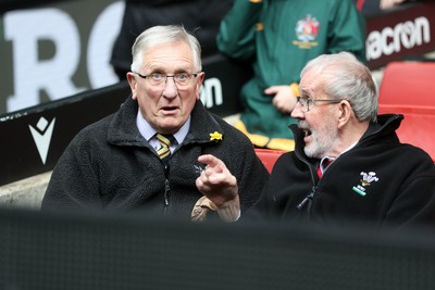 210324 - Newport v Vale of Glamorgan - Welsh Schools Junior Group U11 DC Thomas Plate Final - Roy Bergiers and Idris Powell watch the game