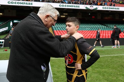 210324 - Newport v Vale of Glamorgan  - Welsh Schools Junior Group U11 DC Thomas Plate Final - Roy Bergiers consoles  the losing Newport players as he presents their medals 