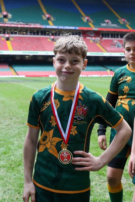 210324 - Newport v Vale of Glamorgan  - Welsh Schools Junior Group U11 DC Thomas Plate Final - Players receive medals 
