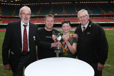 210324 - Newport v Vale of Glamorgan  - Welsh Schools Junior Group U11 DC Thomas Plate Final - Vale of Glamorgan are presented with the trophy by Idris Power of WRU and Roy Bergiers