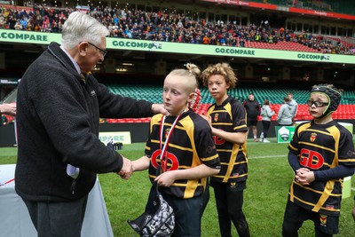 210324 - Newport v Vale of Glamorgan  - Welsh Schools Junior Group U11 DC Thomas Plate Final - Roy Bergiers consoles  the losing Newport players as he presents their medals 