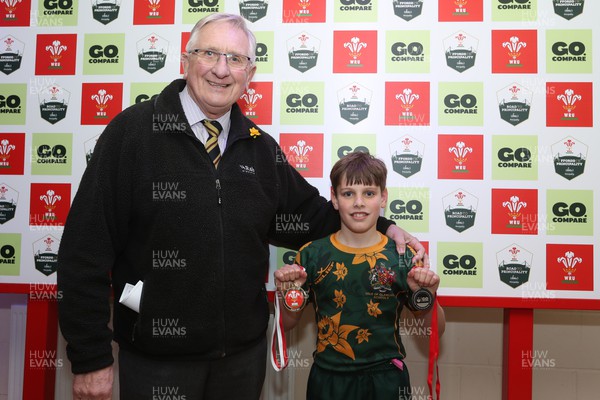 210324 - Newport v Vale of Glamorgan - Welsh Schools Junior Group U11 DC Thomas Plate Final - Man of the Match Reggie Roberts of Vale of Glamorgan with Roy Bergiers