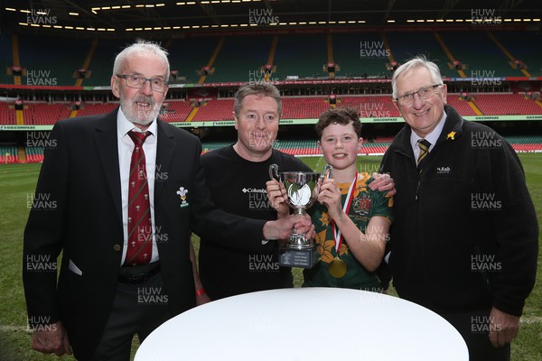 210324 - Newport v Vale of Glamorgan  - Welsh Schools Junior Group U11 DC Thomas Plate Final - Vale of Glamorgan are presented with the trophy by Idris Power of WRU and Roy Bergiers