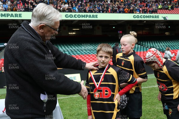 210324 - Newport v Vale of Glamorgan  - Welsh Schools Junior Group U11 DC Thomas Plate Final - Roy Bergiers consoles  the losing Newport players as he presents their medals 