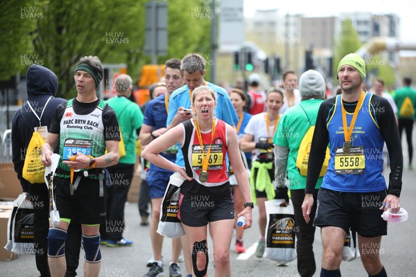 290418 - ABP Newport Wales Marathon - Runners show their emotions at completing the ABP Newport Wales Marathon