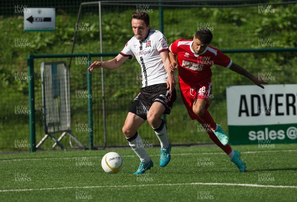 130721 - Newtown v Dundalk, UEFA Europa Conference League first qualifying round, second leg - Raivis Jurkovskis of Dundalk is challenged by Naim Arsan of Newtown