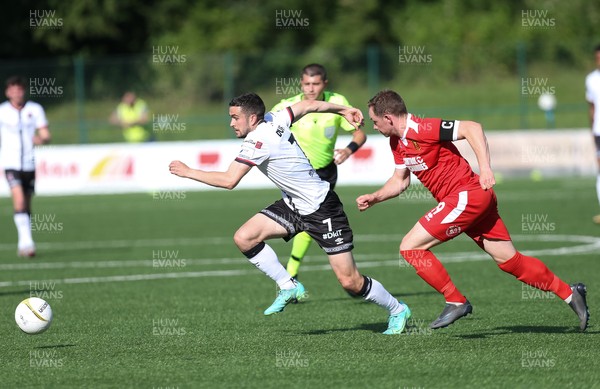 130721 - Newtown v Dundalk, UEFA Europa Conference League first qualifying round, second leg - Michael Duffy of Dundalk gets away from Craig Williams of Newtown