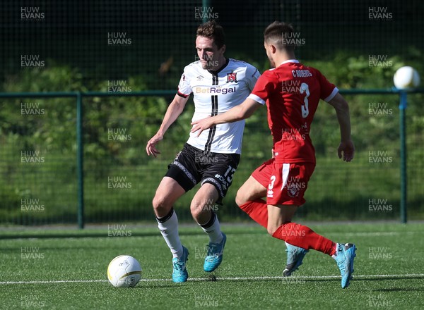 130721 - Newtown v Dundalk, UEFA Europa Conference League first qualifying round, second leg - Raivis Jurkovskis of Dundalk takes on Callum Roberts of Newtown