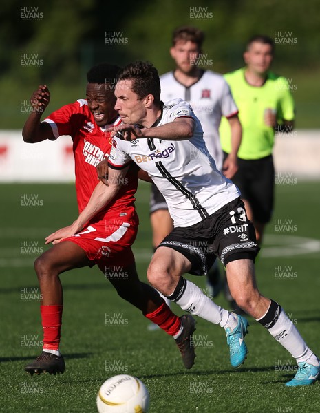 130721 - Newtown v Dundalk, UEFA Europa Conference League first qualifying round, second leg - Raivis Jurkovskis of Dundalk and Lifumpa Mwandwe of Newtown compete for the ball