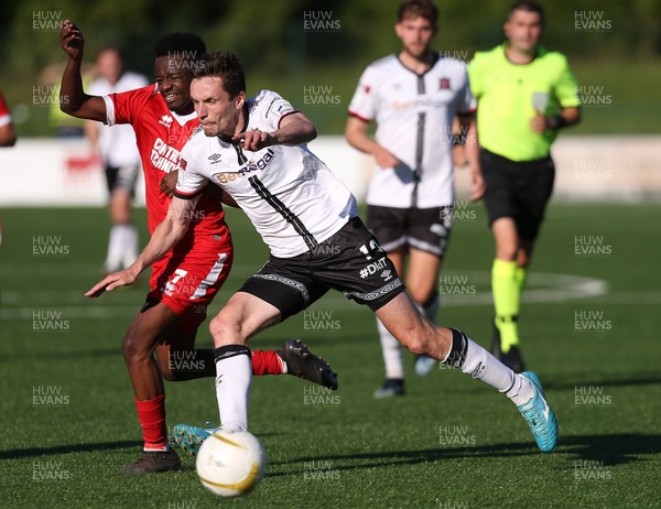 130721 - Newtown v Dundalk, UEFA Europa Conference League first qualifying round, second leg - Raivis Jurkovskis of Dundalk and Lifumpa Mwandwe of Newtown compete for the ball