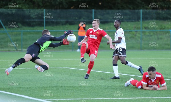 130721 - Newtown v Dundalk, UEFA Europa Conference League first qualifying round, second leg - Alessio Abibi of Dundalk dives to save from Nick Rushton of Newtown