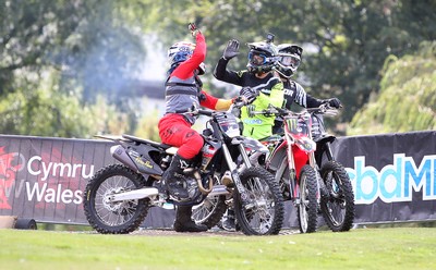 100919 - Nitro World Games - Picture shows riders Jackson Strong, Josh Sheehan and Luc Ackerman setting a new world record for three riders doing double backflips at once in front of Caerphilly Castle, South Wales