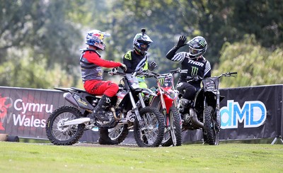 100919 - Nitro World Games - Picture shows riders Jackson Strong, Josh Sheehan and Luc Ackerman setting a new world record for three riders doing double backflips at once in front of Caerphilly Castle, South Wales