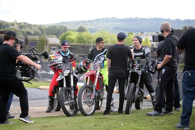 100919 - Nitro World Games - Picture shows riders Jackson Strong, Josh Sheehan and Luc Ackerman setting a new world record for three riders doing double backflips at once in front of Caerphilly Castle, South Wales