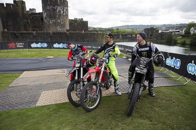 100919 - Nitro World Games - Picture shows riders Jackson Strong, Josh Sheehan and Luc Ackerman setting a new world record for three riders doing double backflips at once in front of Caerphilly Castle, South Wales