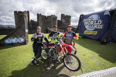 100919 - Nitro World Games - Picture shows riders Jackson Strong, Josh Sheehan and Luc Ackerman setting a new world record for three riders doing double backflips at once in front of Caerphilly Castle, South Wales