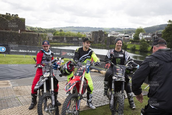 100919 - Nitro World Games - Picture shows riders Jackson Strong, Josh Sheehan and Luc Ackerman setting a new world record for three riders doing double backflips at once in front of Caerphilly Castle, South Wales