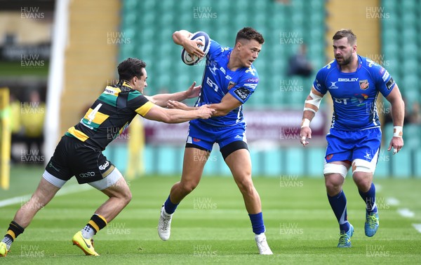 120817 - Northampton Saints v Dragons Rugby - Preseason Friendly - Jared Rosser of Dragons is tackled by Tom Collins of Northampton