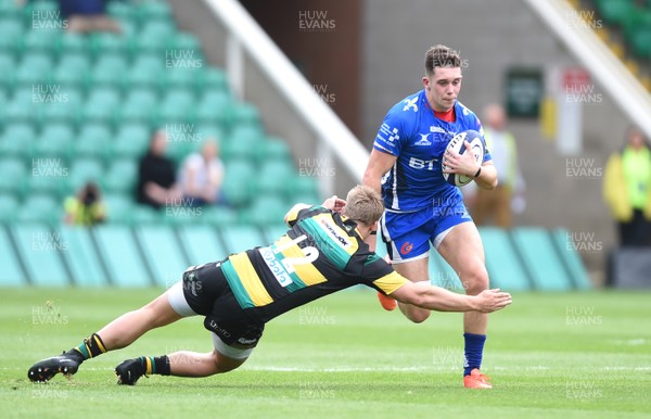 120817 - Northampton Saints v Dragons Rugby - Preseason Friendly - Joe Goodchild of Dragons gets away from Rory Hutchinson of Northampton