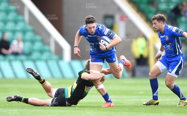 120817 - Northampton Saints v Dragons Rugby - Preseason Friendly - Joe Goodchild of Dragons gets away from Rory Hutchinson of Northampton