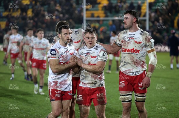 180126 - Northampton Saints v Scarlets - European Rugby Champions Cup - Gareth Davies, Sam Costelow and Max Douglas of Scarlets at full time
