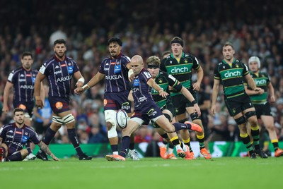 240525 - Northampton Saints v Union Bordeaux-Begles, EPCR Champions Cup Final - Maxime Lucu of Union Bordeaux-Begles kicks ahead