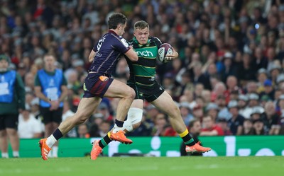 240525 - Northampton Saints v Union Bordeaux-Begles, EPCR Champions Cup Final - Tom Litchfield of Northampton Saints takes on Damian Penaud of Union Bordeaux-Begles