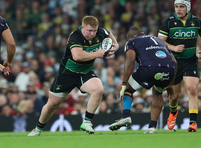 240525 - Northampton Saints v Union Bordeaux-Begles, EPCR Champions Cup Final - Trevor Davison of Northampton Saints takes on Jefferson Poirot of Union Bordeaux-Begles