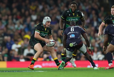 240525 - Northampton Saints v Union Bordeaux-Begles, EPCR Champions Cup Final - Curtis Langdon of Northampton Saints takes on Mahamadou Diaby of Union Bordeaux-Begles