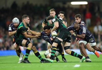 240525 - Northampton Saints v Union Bordeaux-Begles, EPCR Champions Cup Final - Pete Samu of Union Bordeaux-Begles is held