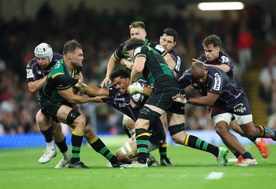 240525 - Northampton Saints v Union Bordeaux-Begles, EPCR Champions Cup Final - Pete Samu of Union Bordeaux-Begles is held