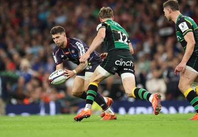 240525 - Northampton Saints v Union Bordeaux-Begles, EPCR Champions Cup Final - Matthieu Jalibert of Union Bordeaux-Begles is tackled as he goes to kick