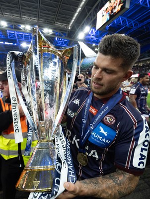 240525 - Northampton Saints v Union Bordeaux-Begles, EPCR Champions Cup Final - Matthieu Jalibert of Union Bordeaux-Begles celebrates with the trophy as they win the Investec Champions Cup