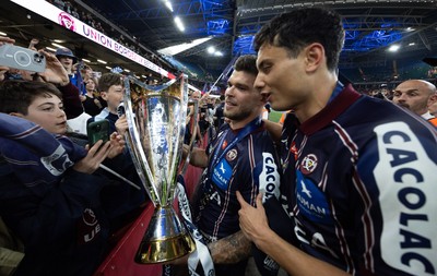 240525 - Northampton Saints v Union Bordeaux-Begles, EPCR Champions Cup Final - Matthieu Jalibert of Union Bordeaux-Begles celebrates with the trophy as they win the Investec Champions Cup