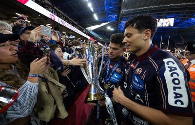 240525 - Northampton Saints v Union Bordeaux-Begles, EPCR Champions Cup Final - Matthieu Jalibert of Union Bordeaux-Begles celebrates with the trophy as they win the Investec Champions Cup