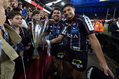 240525 - Northampton Saints v Union Bordeaux-Begles, EPCR Champions Cup Final - Matthieu Jalibert of Union Bordeaux-Begles celebrates with the trophy as they win the Investec Champions Cup